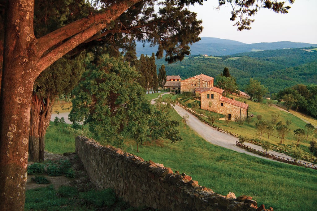Casali di Casole villas seen from a country road